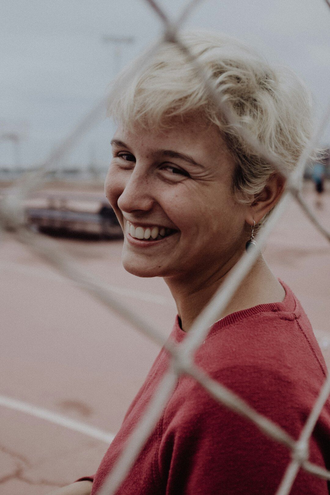 Portrait of a smiling woman with short blonde hair