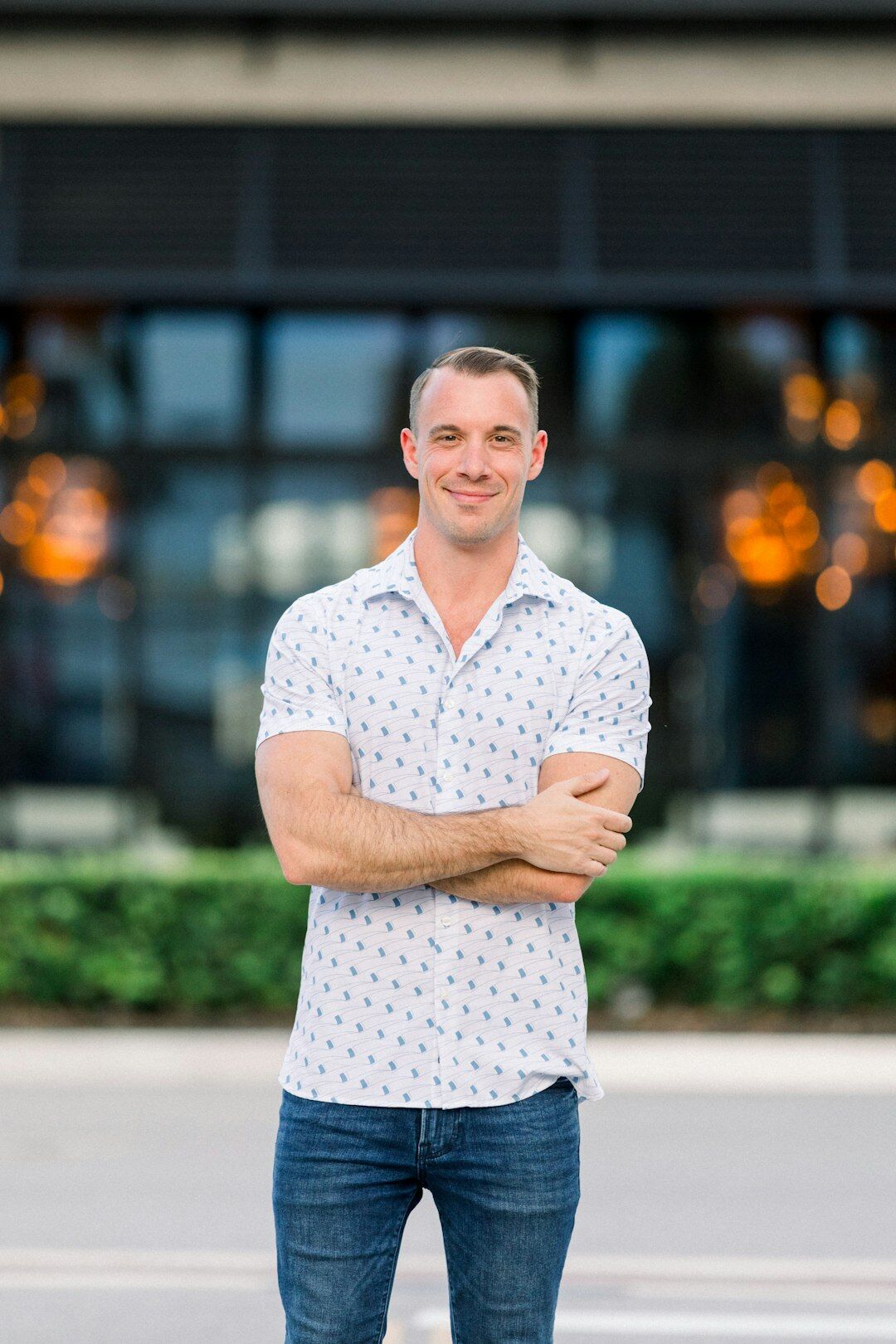 Businessman smiling with arms crossed