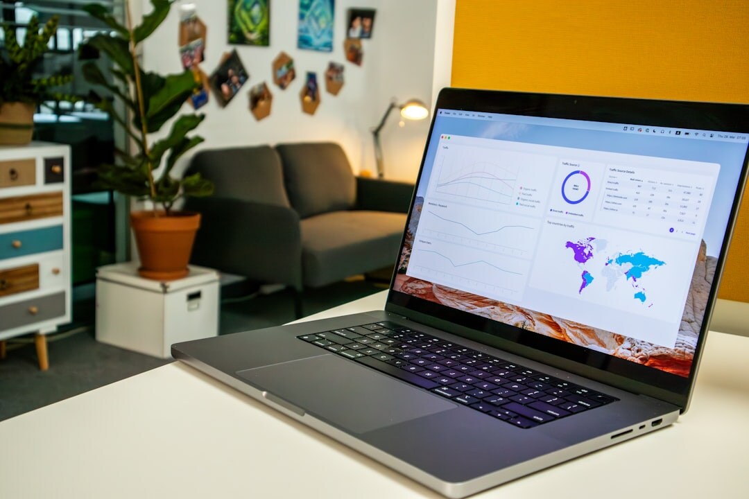 Laptop displaying a business dashboard on a desk