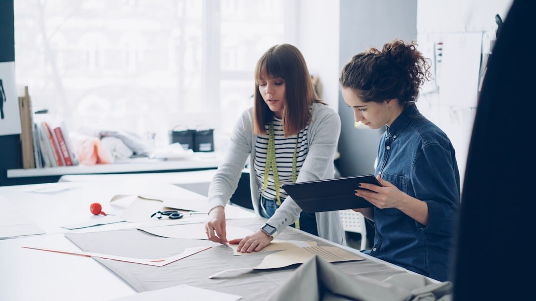 Colleagues collaborating at a table with documents